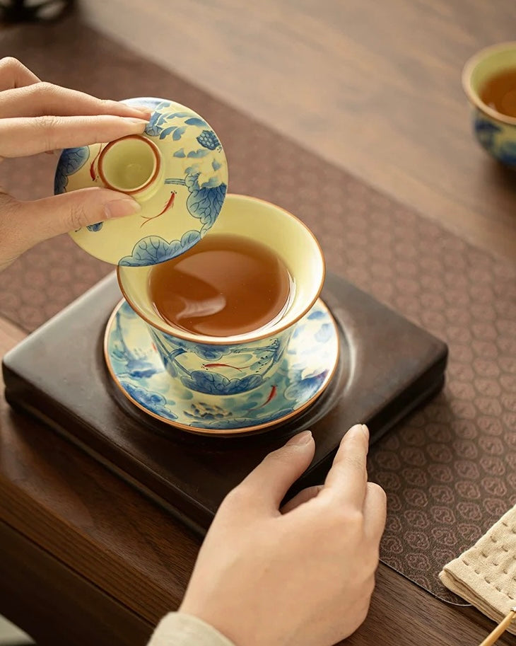 Ru Ware Fish Playing in the Lotus Pond Floating Sancai Gaiwan