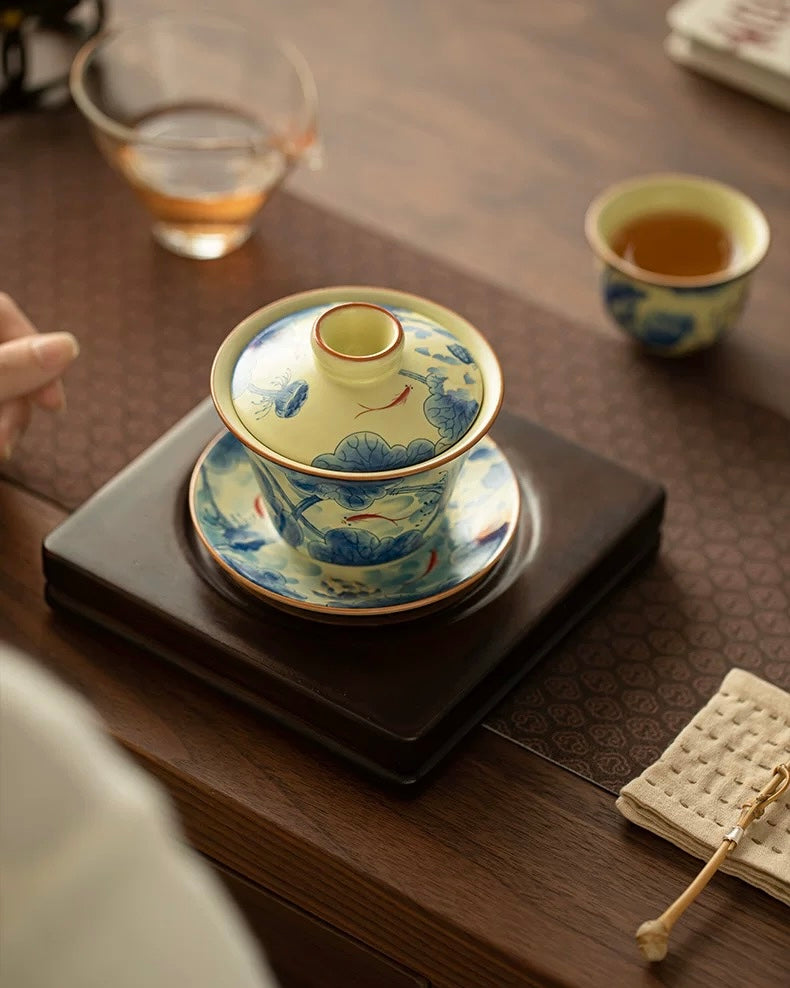 Ru Ware Fish Playing in the Lotus Pond Floating Sancai Gaiwan