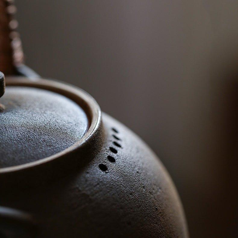 Handcrafted Ceramic Ball Shaped Boiler With Rattan Handle