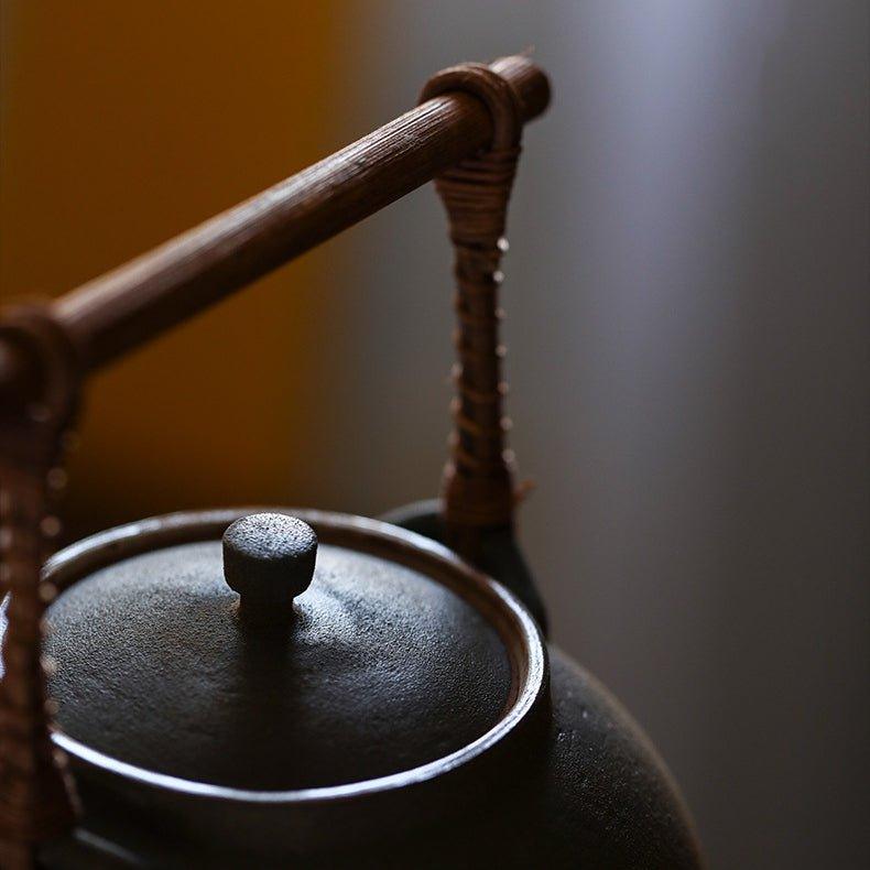 Handcrafted Ceramic Ball Shaped Boiler With Rattan Handle
