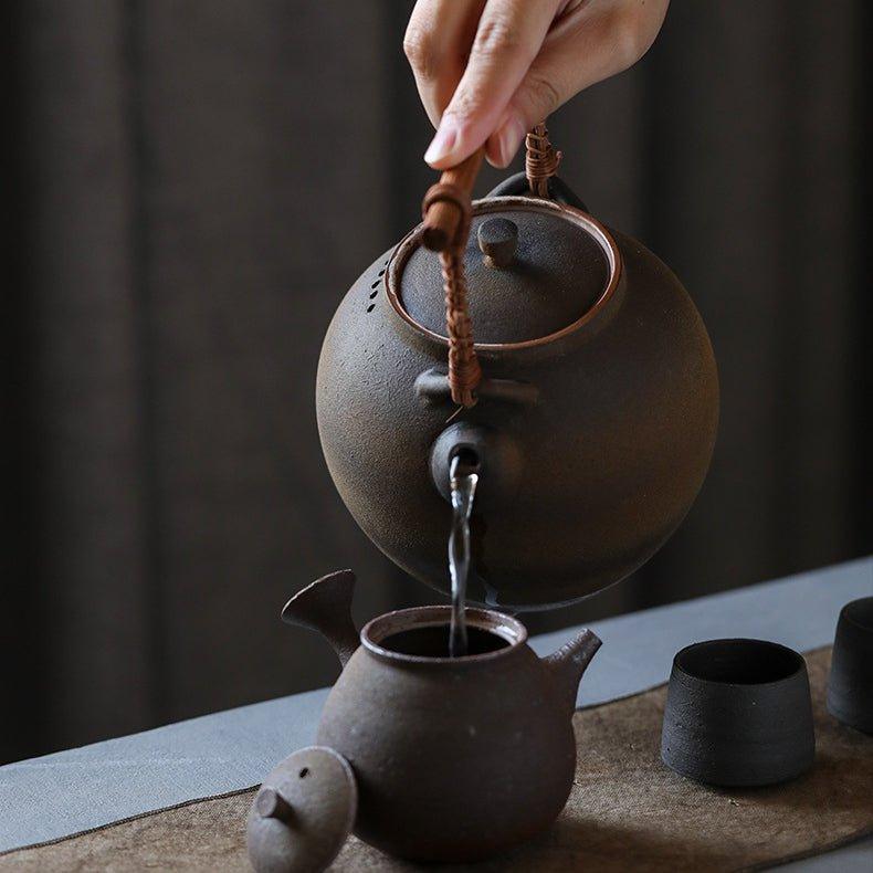 Handcrafted Ceramic Ball Shaped Boiler With Rattan Handle